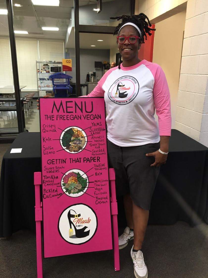 newton with the menu board